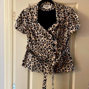 Super cute short sleeve jacket. Always got compliments!